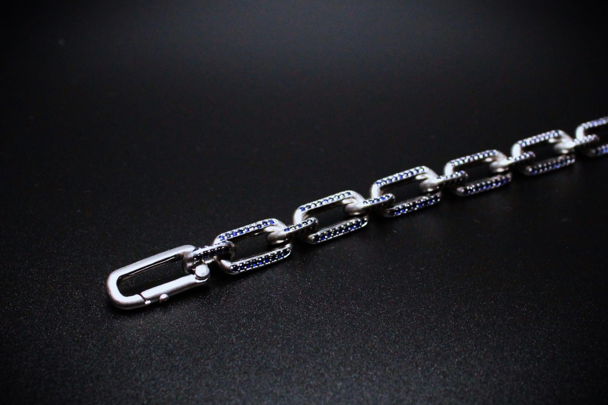 Elongated diamond link bracelet in Sterling Silver with Blue Sapphire
